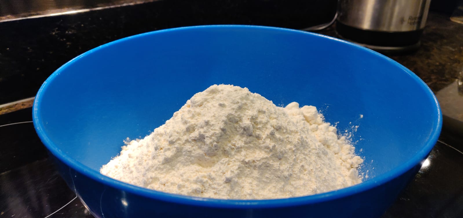 Adding the flour to the bowl